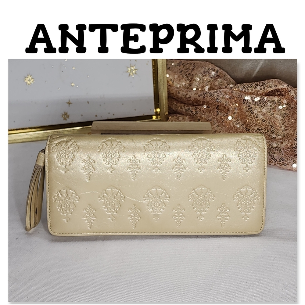 NWOT Antiprema Gold Toned Embossed Long Wallet